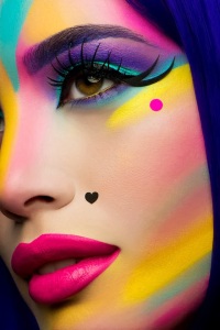 Rock Beauty, karla Powell - This image displays random strokes of colour across the face
